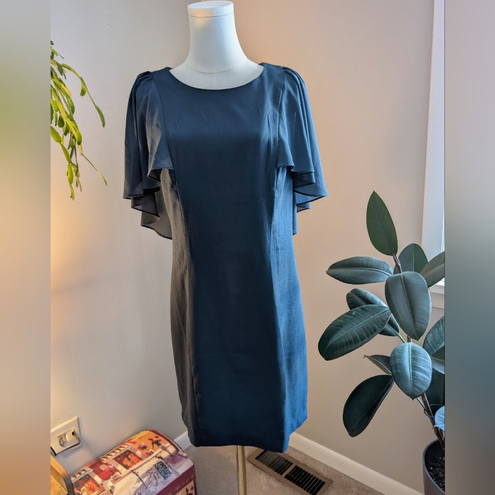 Elegant Blue Tailored Dress With Capelet Design